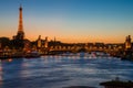 Romantic sunset in Paris, France with Eiffel Tower and river. Royalty Free Stock Photo