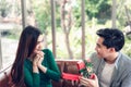 Romantic Surprise and Couple Love Valentine Concept, Young Man is Presenting Surprised to His Girlfriend at Home. Beautiful Woman Royalty Free Stock Photo