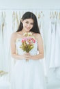 Romantic and sweet moment,Bride holding a bouquet on hand for wedding,Beautiful asian woman smiling and happy Royalty Free Stock Photo