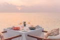 Sunset at table dinner with seascape and horizon, romance Royalty Free Stock Photo