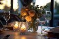 Romantic table setting with candles and flowers Royalty Free Stock Photo