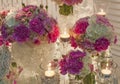 Romantic table setting with flowers and candles Royalty Free Stock Photo