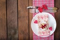 Romantic table setting for Valentines day in a rustic style. Royalty Free Stock Photo