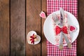 Romantic table setting for Valentines day in a rustic style. Royalty Free Stock Photo