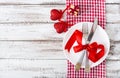 Romantic table setting for Valentines day in a rustic style. Royalty Free Stock Photo