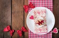 Romantic table setting for Valentines day in a rustic style. Royalty Free Stock Photo