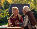 Romantic talk of senior couple in garden Royalty Free Stock Photo