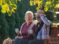 Romantic talk of senior couple in park Royalty Free Stock Photo