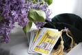 Romantic Tarot Setup Background. Tarot cards and lilac flowers. Royalty Free Stock Photo