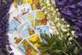 Romantic Tarot Setup Background. Tarot cards and Lupin flowers. Royalty Free Stock Photo