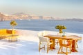 Romantic Tranquil Open Air Cosy Terrace Restaurant in Beautiful Oia Village on Santorini Island in Greece Before the Sunset Royalty Free Stock Photo