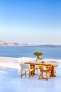 Romantic Tranquil Open Air Cosy Terrace Restaurant in Beautiful Oia Village on Santorini Island in Greece Before the Sunset Royalty Free Stock Photo