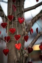 Romantic tree with beautiful valentine's day decorations hanging outdoors