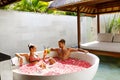 Romantic Vacation. Couple In Love Relaxing At Spa With Cocktails Royalty Free Stock Photo