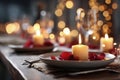 romantic ValentineÃ¢â¬â¢s Day dinner table setup, candles, rose petals Royalty Free Stock Photo