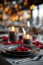 romantic ValentineÃ¢â¬â¢s Day dinner table setup, candles, rose petals Royalty Free Stock Photo