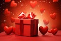 Romantic Valentineâs Gift - Red Box with Bow Amidst Glowing Hearts Royalty Free Stock Photo