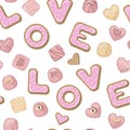 Pink chocolate candies and cookies in the shape of the letters LOVE isolated on white background Royalty Free Stock Photo