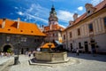 Romantic View of the Castle Tower and Fountain in the Courtyard in Cesky Krumlov