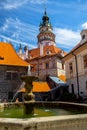 Romantic View of the Castle Tower and Fountain in the Courtyard in Cesky Krumlov