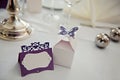 Romantic vintage name sign on the table at wedding reception closeup.