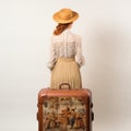 Romantic Vintage Style: Girl With Hat And Painting On Bag Royalty Free Stock Photo