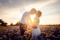 Romantic wedding in the countryside, bride kissing the groom Royalty Free Stock Photo