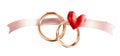 Romantic wedding rings and heart design with gold bands and red heart Royalty Free Stock Photo