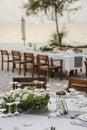 Romantic wedding table design at sunset outside on asian beach Royalty Free Stock Photo