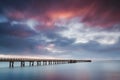 Romantic wharf in Auckland of New Zealand Beautiful pier on sunrise with pink cloud sky .Summer Landscape