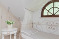 Romantic white canopy bed