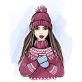 Romantic Winter Girl in Knitted Sweater and Hat Enjoying a Cup of coffee