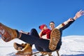 Romantic winter scene, happy young couple having fun on fresh show on winter vacatio, mountain nature landscape