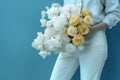 woman blue hand yellow white romantic bouquet hold flower sweater floral. Generative AI. Royalty Free Stock Photo