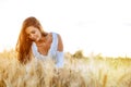 Romantic woman in fields of barley Royalty Free Stock Photo