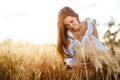 Romantic woman in fields of barley Royalty Free Stock Photo