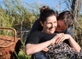 Romantic woman & man enjoying picnic outdoors coun Royalty Free Stock Photo