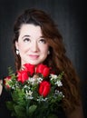 Romantic woman with red roses