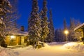 Romantic wooden cabins in the snow