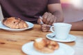 Romantic young African couple holding hands at a sidewalk cafe Royalty Free Stock Photo