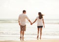 Romantic Young Couple on the Beach at Sunset Royalty Free Stock Photo