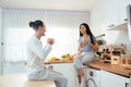 Romantic young couple drinking coffee together in the kitchen Royalty Free Stock Photo