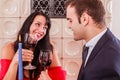 Romantic young couple drinking red wine Royalty Free Stock Photo