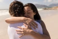 Romantic young couple embracing each other on beach Royalty Free Stock Photo