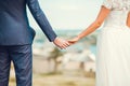 Romantic young couple enjoying sun near river