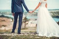 Romantic young couple enjoying sun near river