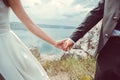 Romantic young couple enjoying sun near river