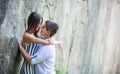 Romantic young couple going to kiss while standing at cliff Royalty Free Stock Photo