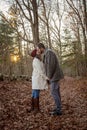 Romantic young couple holding hands the New England woods Royalty Free Stock Photo