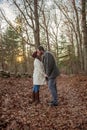 Romantic young couple holding hands the New England woods Royalty Free Stock Photo